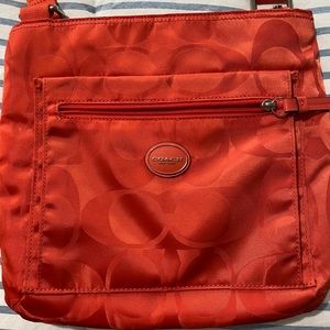 Coach crossbody purse.